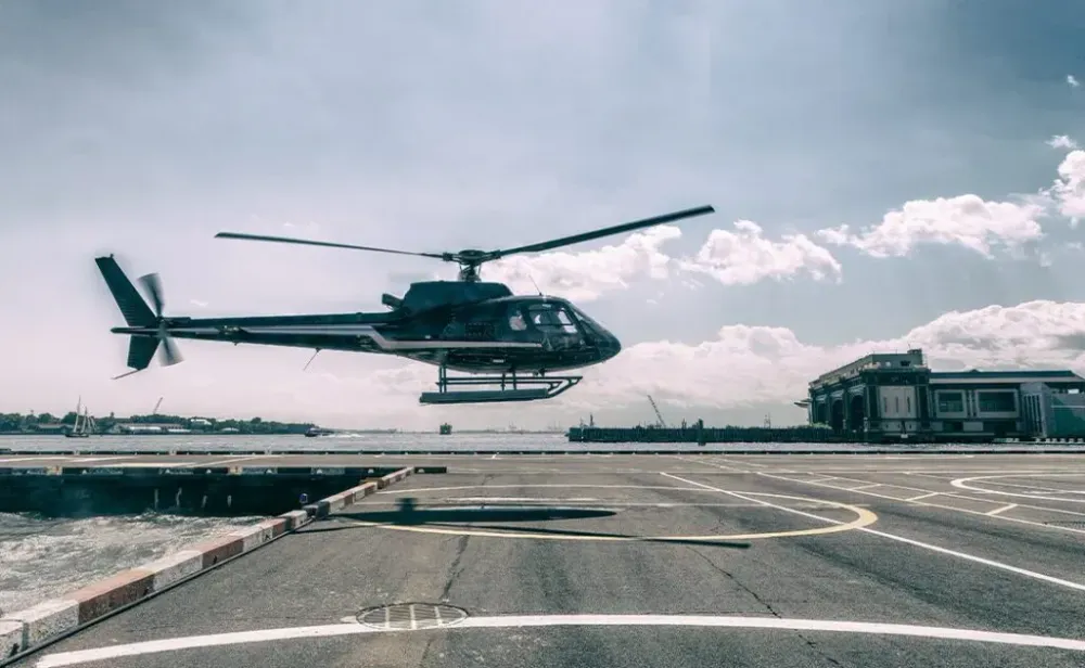 Black Helicopter flying for a City Tour